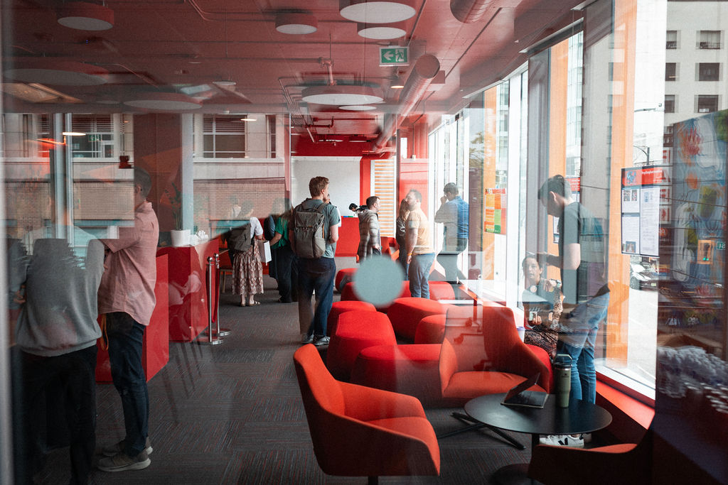 Students in the common area of Adler University's Vancouver campus.